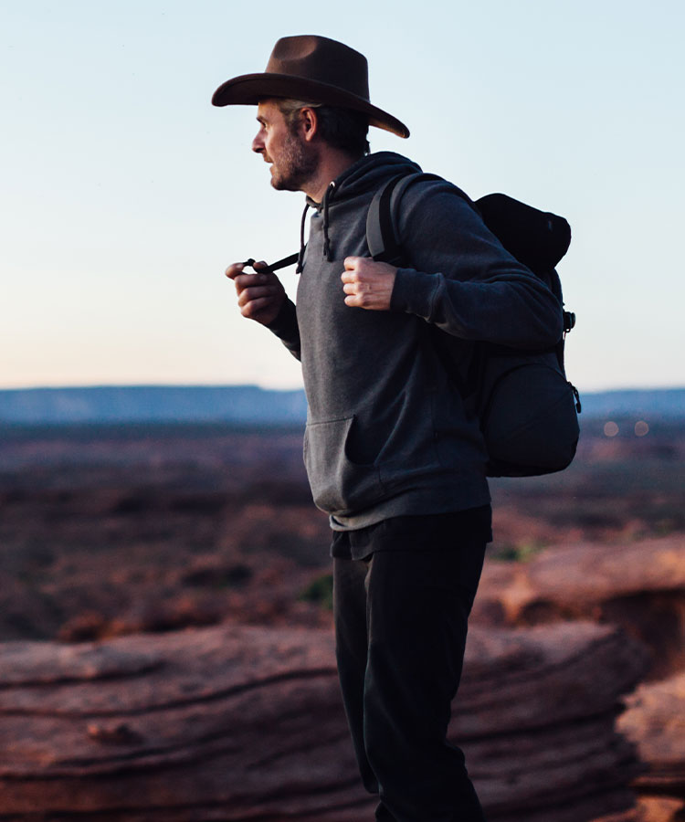 Hiker on edge of cliff