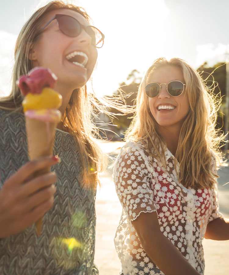 Girlfriends eating Ice Cream Cones