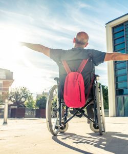 Man in wheelchair soaking up the sun