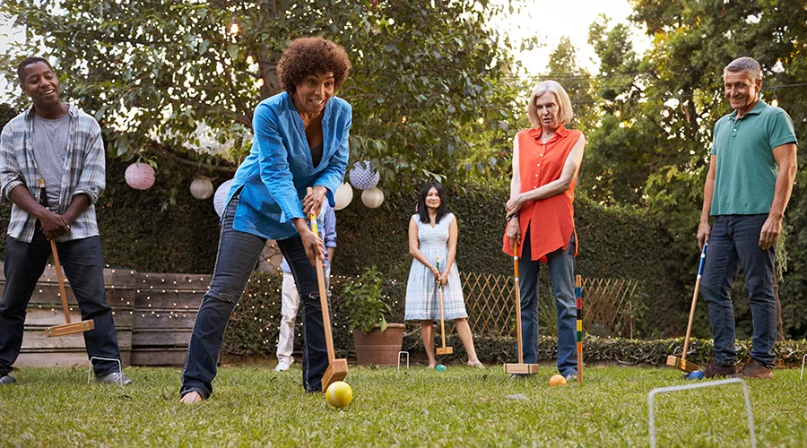 People playing croquet