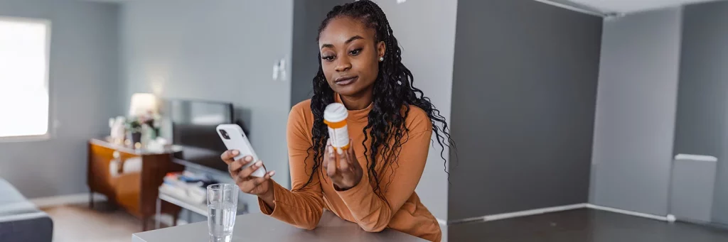 UCHealth woman ordering pharmacy delivery through UCHealth app