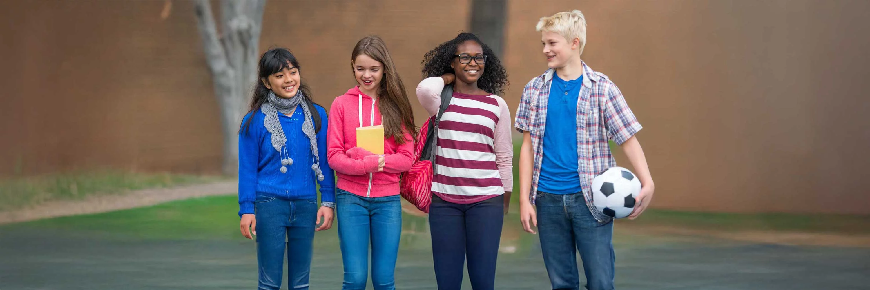 UCHealth Healthy Hearts and Minds kids walking outside of school