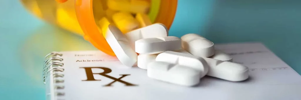 UCHealth antibiotics and prescription pad on counter