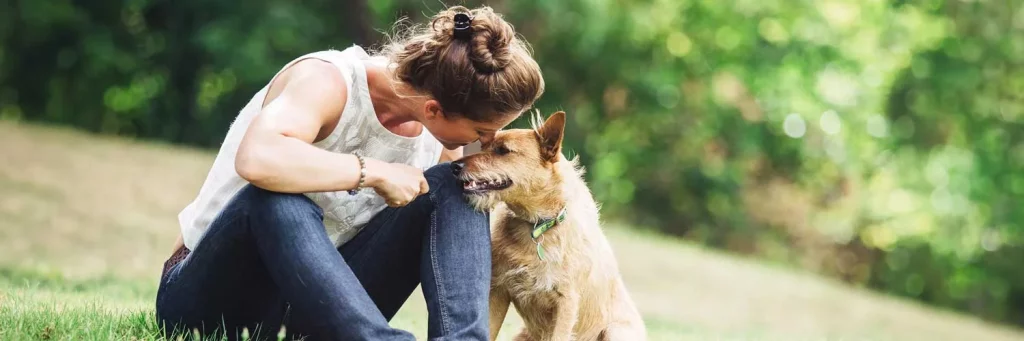 UCHealth about UCHealth lady with dog in park