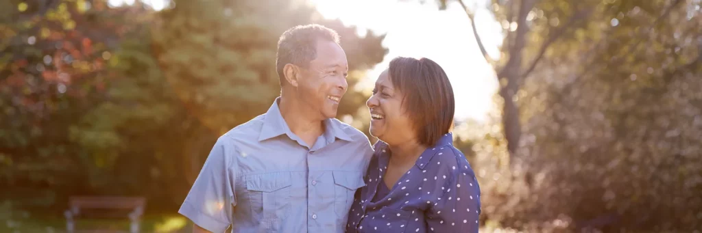 UCHealth Lung transplant couple laughing on a trail