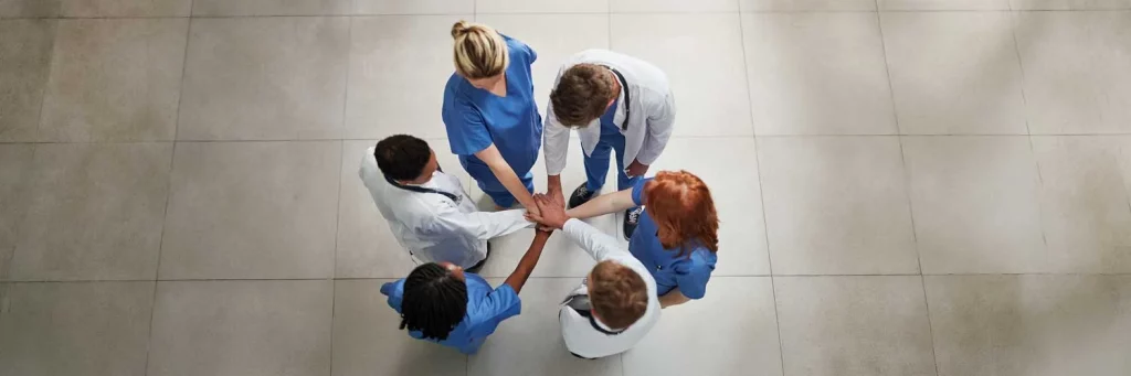 UCHealth UCHealth Parkview Pulmonary/Critical Care Fellowship group of providers in a huddle