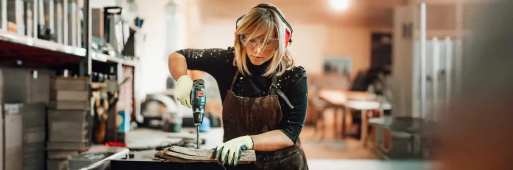 UCHealth eye melanoma, woman working in woodshop.