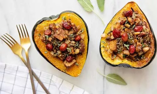 Natural Grocers Squash Stuffed with Pears, Wild Rice and Tempeh