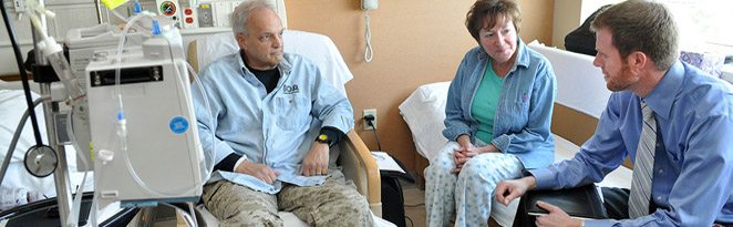 Patients consult with a cancer specialist at the CU Cancer Center in Aurora, Colorado.