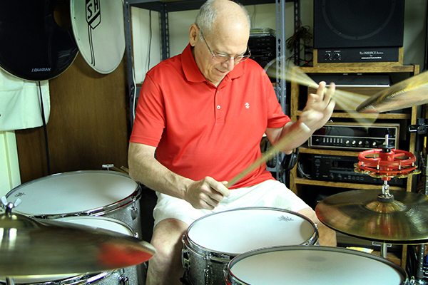 Steve Hoffelt plays the drums in the basement of his Greeley home. At first, Hoffelt, 70, chalked up symptoms of coronary heart disease to just getting old. But luckily, doctors didn’t and were able to help Hoffelt before it was too late.