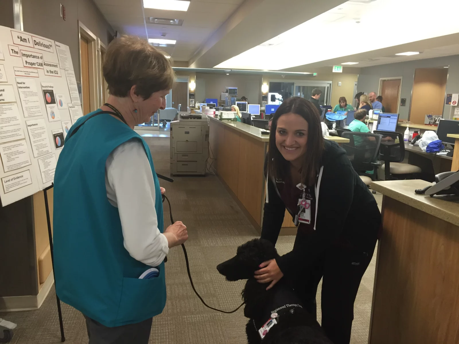 Surgical Intensive Care Unit nursing assistant Karley Beddoe gives Ebony a little love, and vice versa.