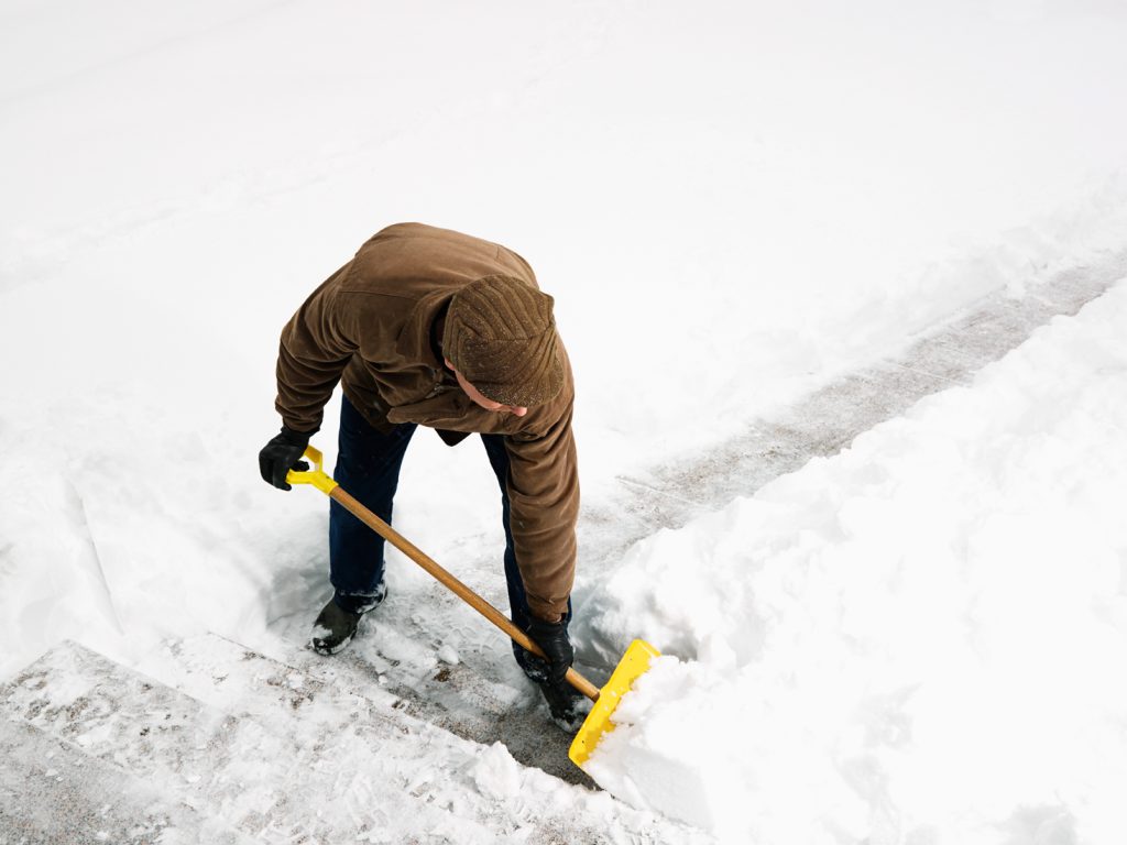 man shoveling snow