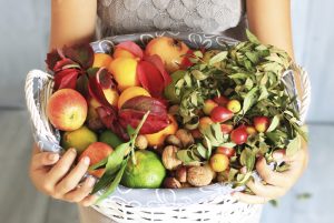 big basket full of colorful fruit