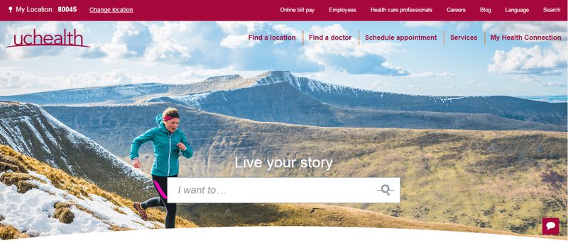 a woman is running at high altitude with mountains in the background