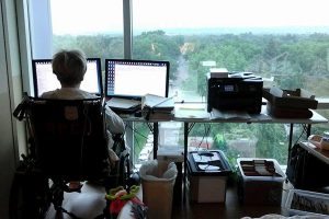 The patient set up computers in her hospital room so she could get back to work.