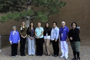 Members of the Patient and Family Advisory Council are pictured (from left to right): Sharon Douglas, Britta Emenecker, Nicki Skinner, Yvonne Muise, Christy Knouf, Stephanie Upton, Neil Klockziem, Kathy Flahive. Not Pictured: Bob Hinterberger.