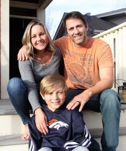 The George family on the steps of their home.