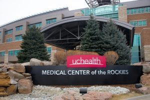 The is a photo of the main entrance of UCHealth Medical Center of the Rockies, located in Loveland, Colo.