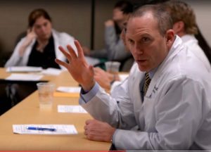 Tom Purcell, MD, MBA, is shown during a neuroendocrine multidisciplinary clinic.