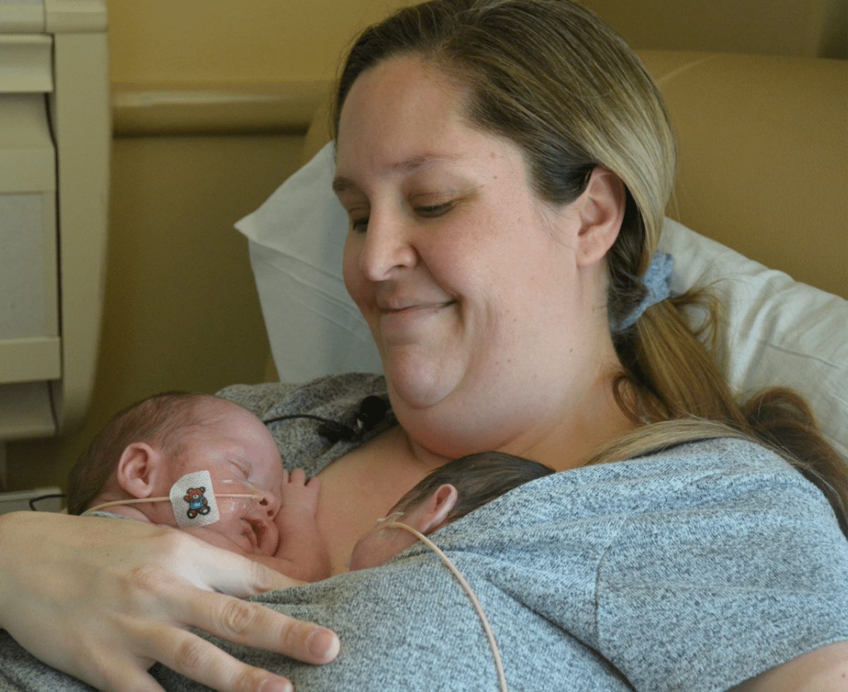 Nicolle Lewis-McTague holds her twins, Parker (left), and Paisley, (right), in the UCHealth Memorial Hospital NICU. Lewis-McTague enjoys skin-to-skin contact with the twins, born April 26.