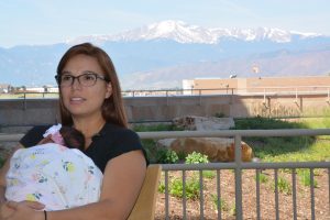Alexandra Cordero holds her new baby, Elena, outside of Memorial Hospital North.