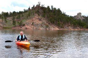 Stan Kepley gets ready to kayak near his home at Curt Gowdy State Park west of Cheyenne, Wyoming.