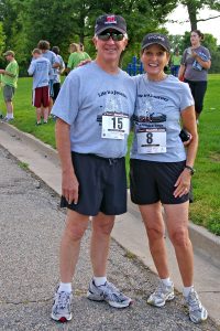 Jeanne Lambert and her husband, John, are pictured at the Run for Hope 5K in Fort Collins' City Park.