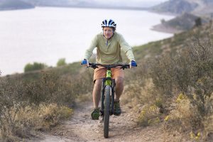 Randy Joseph cruises on his bicycle after hip replacement surgery.