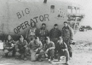 WWII navigator Lt. Vernon Bingham, second from left, and his crew in front of their B-24 bomber.