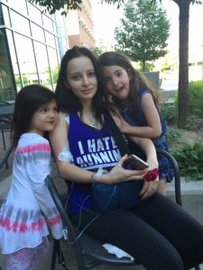 Danielle gets a visit from her little sisters during her treatment at UCHealth's University of Colorado Hospital.