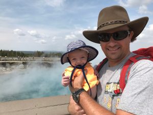 Finn, a success story about babies born extremely premature, with his father at Yellowstone the summer 2017.