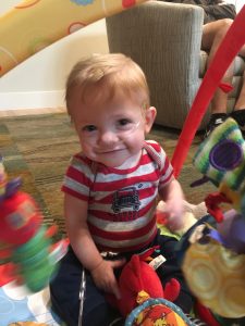 Finn, a babies born extremely premature success story, plays with his toys.