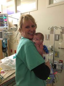 Nurse Lou Ann Stout with Finn