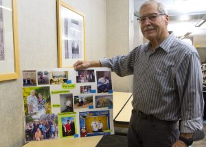 Michael Mayberry with a collage of his former, much heavier self.