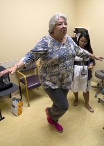 Gayle Craun is shown during a balance test as part of the LongROAD study.