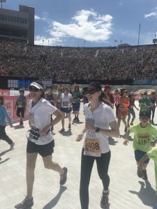 Becky Pomerleau running in a race after her transplant.