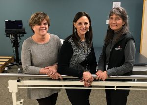 From left, Nancy Malley, Patricia Kupyer and Carol Gertsch, the UCHealth Medical Center of the Rockies team that led Aaron Macpherson through the speech, occupational and physical therapy involved in his stroke recovery.