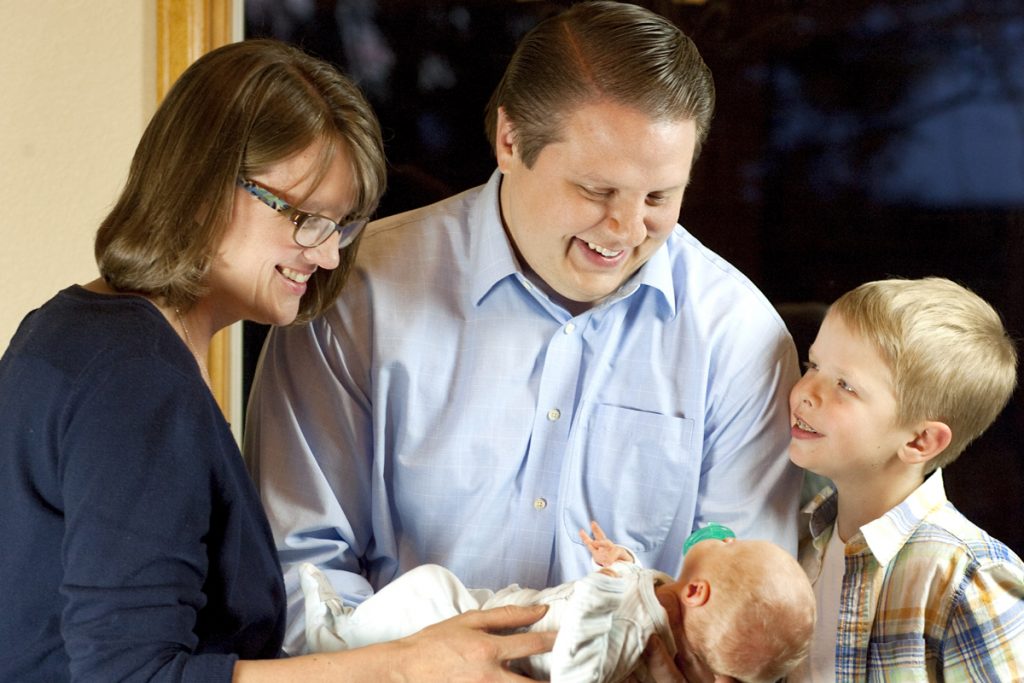 Jennifer and Chris Leffler with their sons, Beckett, center, and Elliott, 8.