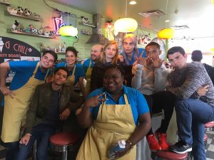 Peyton poses with actors at an ice cream shop in Toronto during the filming of Life in a Year.