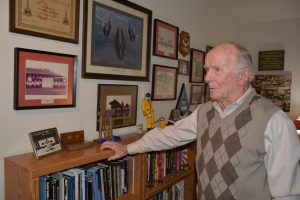 Air Force Ret. Maj. Gen. Halloran in his home office, showing momentos from his Air Force career.