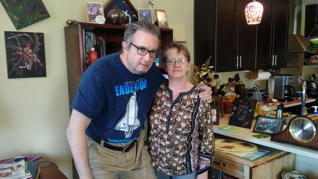 Randy Schiell with his wife, Janelle, in their Denver home.