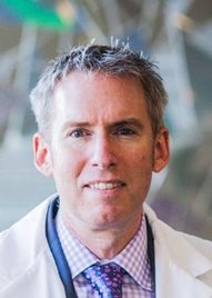 A photo of Dr. Ross Camidge