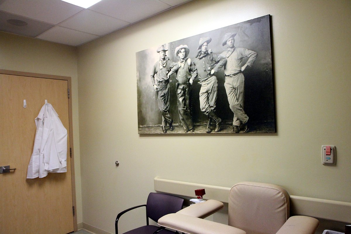 lab draw room with lights on and cowboy painting on the wall.