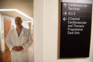 Dr. Peter Walinsky walks through a hallway at UCHealth Memorial Hospital Central.
