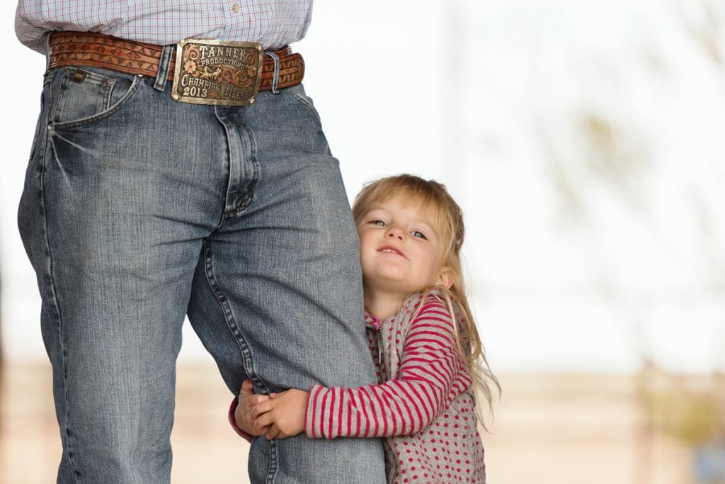 Charli Chant hugs her dad's left leg. That's the one he nearly lost in a terrible car crash. Charli and her mom survived the accident unscathed, but Archie took the brunt of it. Photo by Jennifer Stewart for UCHealth.