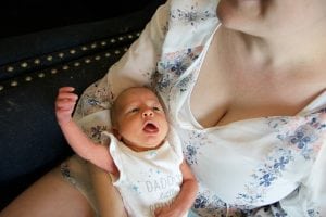 Riley is getting bigger and stronger every day. Here she gesticulates after a breastfeeding session.