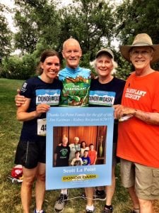 Amy and Scott La Point, left, with Ruthie and Jim Eastman, right, at the 2018 Donor Dash. La Point gave his kidney to Eastman and the men and their families have since bonded.