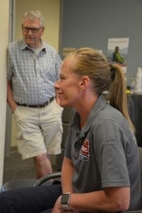 Norm Churchill stands near Kirstin Buchanan