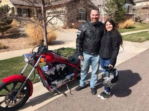 James Morales and his daughter, Layla, in front of their home in Aurora.