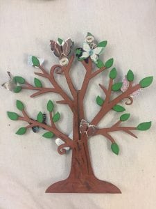 Pieces depicting princess crown and family tree are keepsakes created with Joes daughters to preserve memories of him